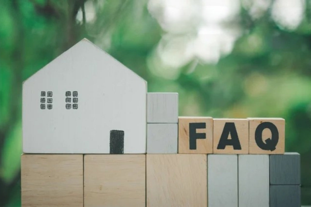 Building blocks that make a house and say FAQ.