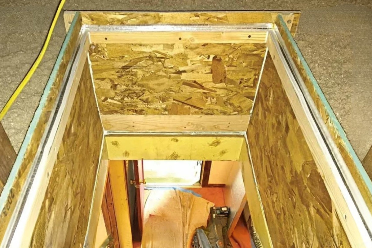 Looking down into the house through the open attic hatch.