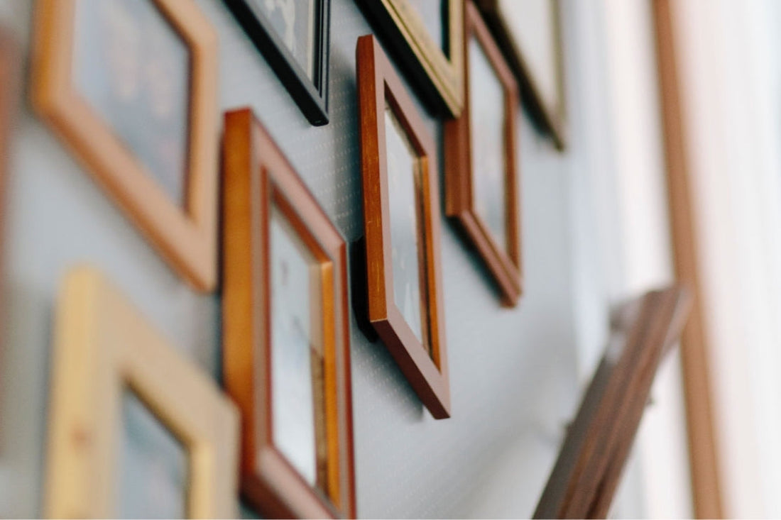 Framed photos line the stairway.